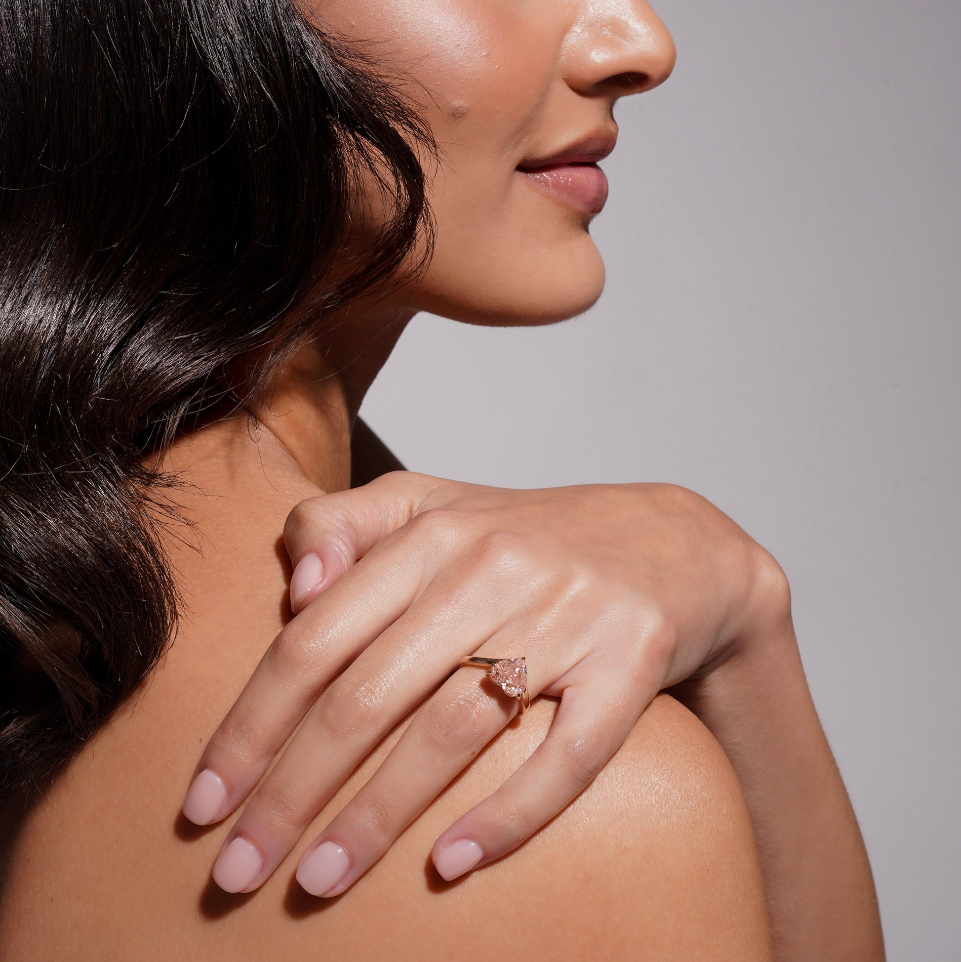 Close-up of 3 carat pink heart-cut lab-grown diamond in the Muse Float Ring