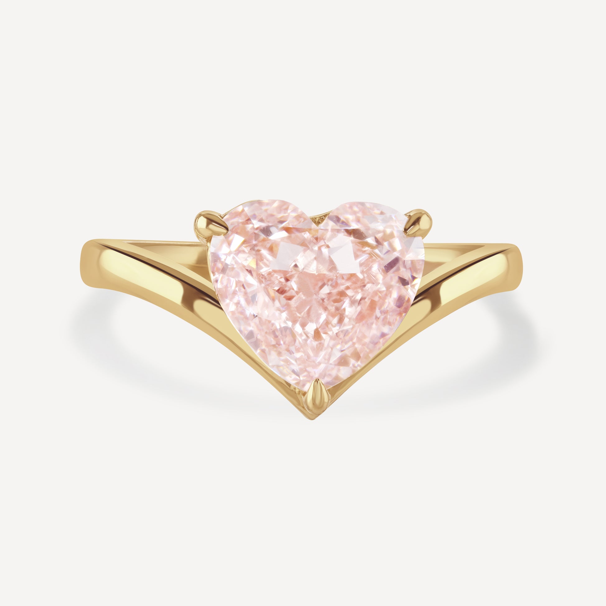 Close up of 3 carat pink heart-cut lab-grown diamond Muse Float Ring against white background