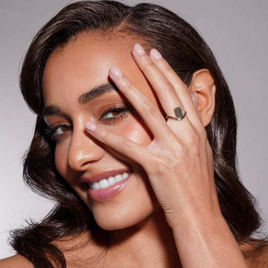 Poise Float Ring with 3 carat green emerald-cut lab-grown diamond in modern 18k white gold setting